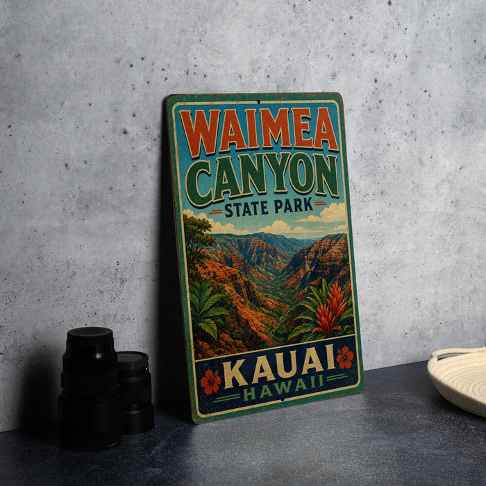 A vintage-style metal sign for Waimea Canyon State Park in Kauai, Hawaii, featuring a scenic landscape with mountains and palm trees.