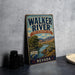 A vintage metal sign for Walker River State Recreation Area in Nevada, featuring a scenic landscape with mountains, a river, and a cabin.