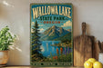 A vintage-style metal sign for Wallowa Lake State Park in Oregon, featuring a scenic mountain landscape with a lake and colorful wildflowers.