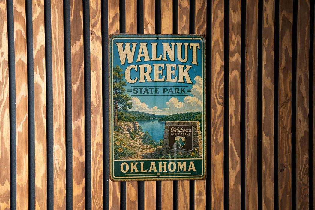 A vintage metal sign for Walnut Creek State Park in Oklahoma, featuring a scenic landscape with a lake and mountains.