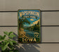 A vintage-style metal sign for Wapsipinicon State Park in Iowa, featuring a scenic landscape with a river and bridge.