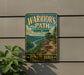 A vintage-style metal sign for Warrior's Path State Park in Pennsylvania, featuring a scenic mountain landscape with a winding trail.