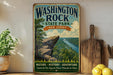 A vintage-style metal sign for Washington Rock State Park in New Jersey, featuring a scenic image of the park and a message about nature, history, and adventure.