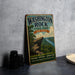 A vintage-style metal sign for Washington Rock State Park in New Jersey, featuring a scenic landscape with a cliff and river.