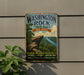 A vintage-style metal sign for Washington Rock State Park in New Jersey, featuring a scenic landscape with a cliff and river.
