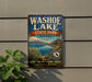 A vintage-style metal sign for Washoe Lake State Park, Nevada, featuring a scenic landscape with mountains, a lake, and various outdoor activities such as hiking, fishing, and boating.