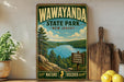 A vintage-style metal sign for Wawayanda State Park in New Jersey, featuring a scenic landscape with a lake and mountains.