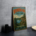 A vintage-style metal sign for Weinberg-King State Park in Illinois, featuring a scenic landscape with a lake and forest.