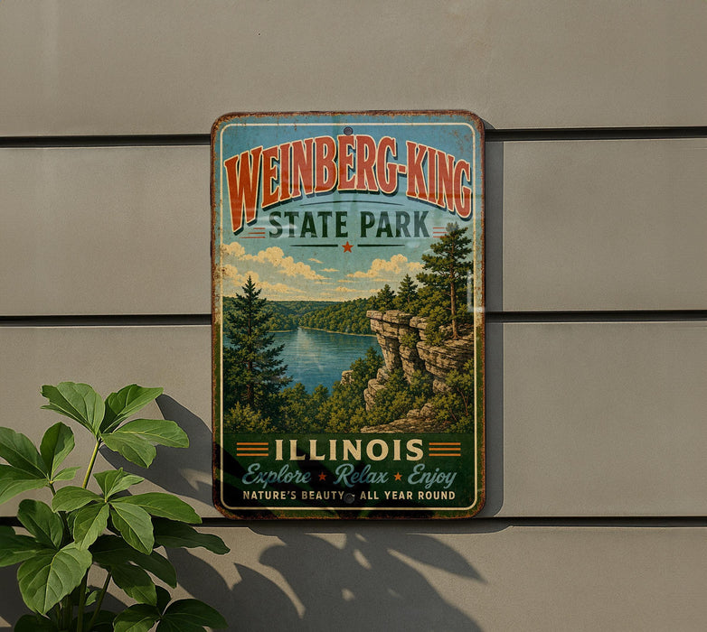 A vintage-style metal sign for Weinberg-King State Park in Illinois, featuring a scenic landscape with a lake and forest.