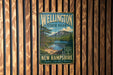 A vintage-style metal sign for Wellington State Park in New Hampshire, featuring a scenic landscape with a lake and mountains.
