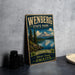 A vintage-style metal sign for Wenberg State Park, featuring a scenic landscape with a mountain, lake, and pine trees.