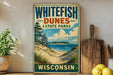 A vintage-style sign for Whitewater Dunes State Park in Wisconsin, featuring a scenic landscape with a beach, dunes, and pine trees.