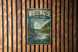 A vintage metal sign for Whitewater State Park in Minnesota, featuring a scenic landscape with a river, trees, and mountains.