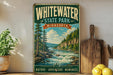 A vintage-style sign for Whitewater State Park in Minnesota, featuring a scenic landscape with a river and pine trees.