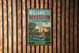 A vintage-style metal sign for Willamette Mission State Park in Oregon, featuring a scenic illustration of a church and a river.