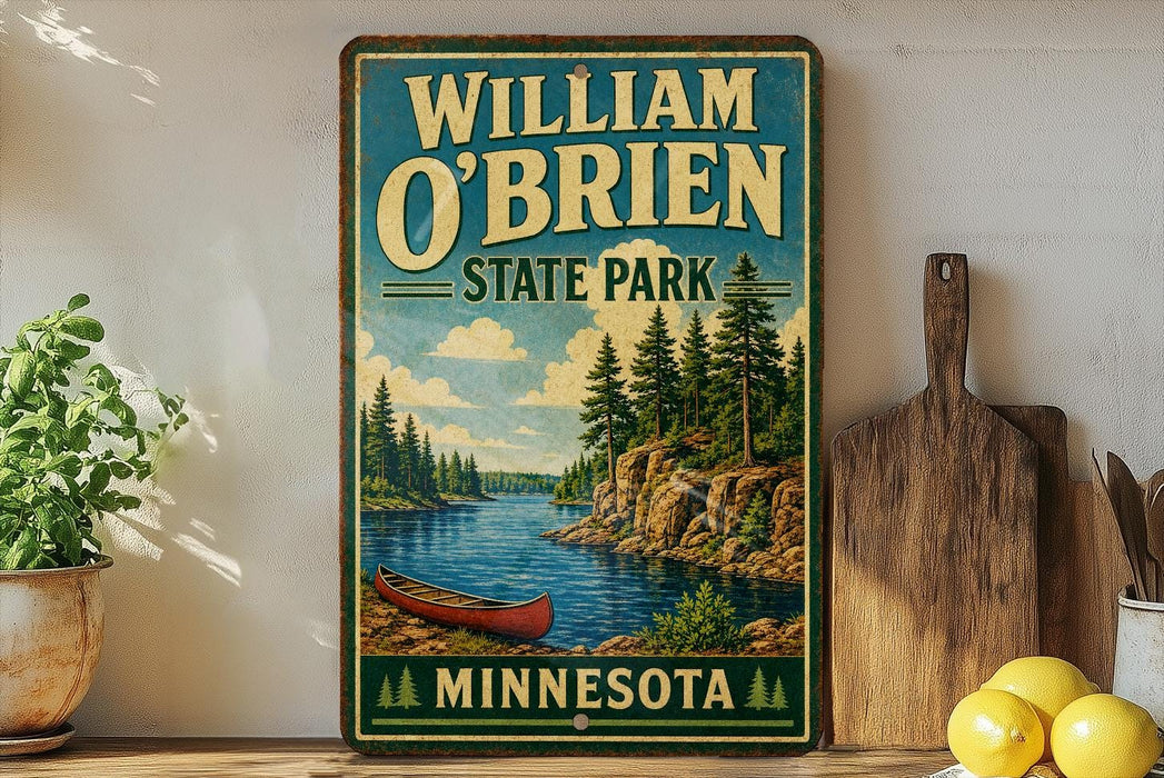 A vintage-style sign for William O'Brien State Park in Minnesota, featuring a scenic illustration of a lake, pine trees, and a canoe.