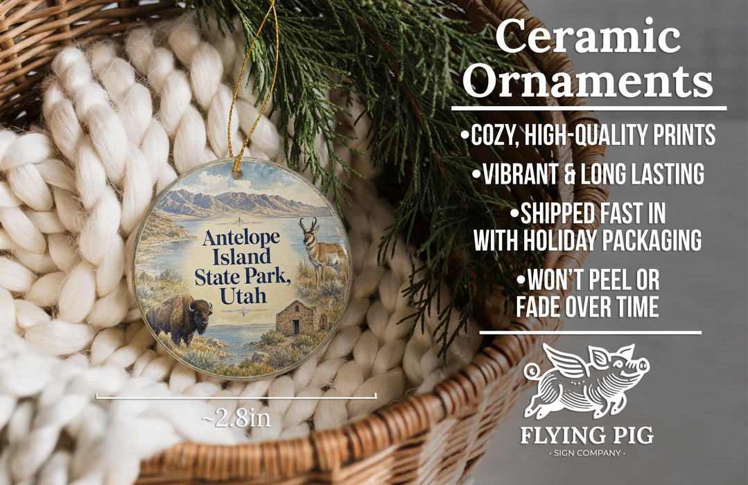 Ceramic ornaments, featuring a design of Antelope Island State Park in Utah, are displayed in a woven basket.