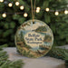 A round ornament with a scenic image of Belfair State Park in Washington, featuring a cabin, pine trees, and a body of water.