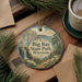 A decorative ornament featuring a scenic landscape of Big Bay State Park, Wisconsin, with pine trees and a waterfall.