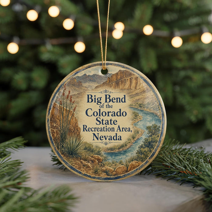A round ornament with a scenic image of the Big Bend of the Colorado State Recreation Area, Nevada, hanging from a string.