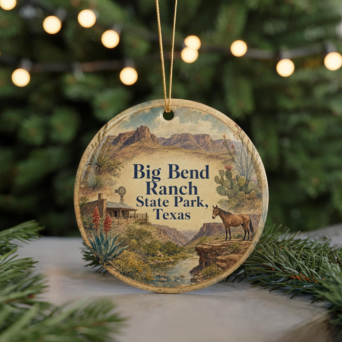 A round ornament with a scenic image of Big Bend Ranch, a ranch in Texas, featuring a horse, cactus, and a house.