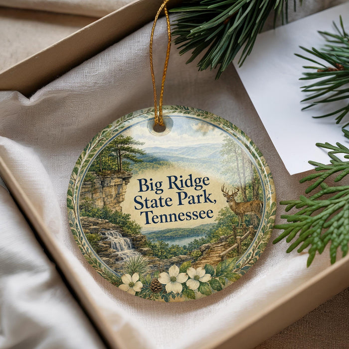A decorative ornament with a scenic image of Big Ridge State Park, Tennessee, hanging from a string.