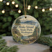 A round ornament with a scenic image of Lake Island, Washington, featuring a boat on the water, surrounded by pine trees and mountains.
