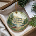 A round ornament with a scenic image of a lake and trees, featuring the text "Bomoseen State Park, Vermont" on it.