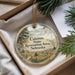 A decorative ornament with a scenic landscape of Calamus State Recreation Area in Nebraska, featuring a deer in the foreground and a cabin in the background.