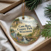 A decorative ornament with a scenic landscape of Cam-Rock County Park, Wisconsin, featuring a waterfall, pine trees, and a bridge.