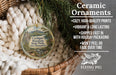 Ceramic ornaments, featuring a scenic image of Cardigan Mountain State Park, New Hampshire, hanging from a wicker basket.