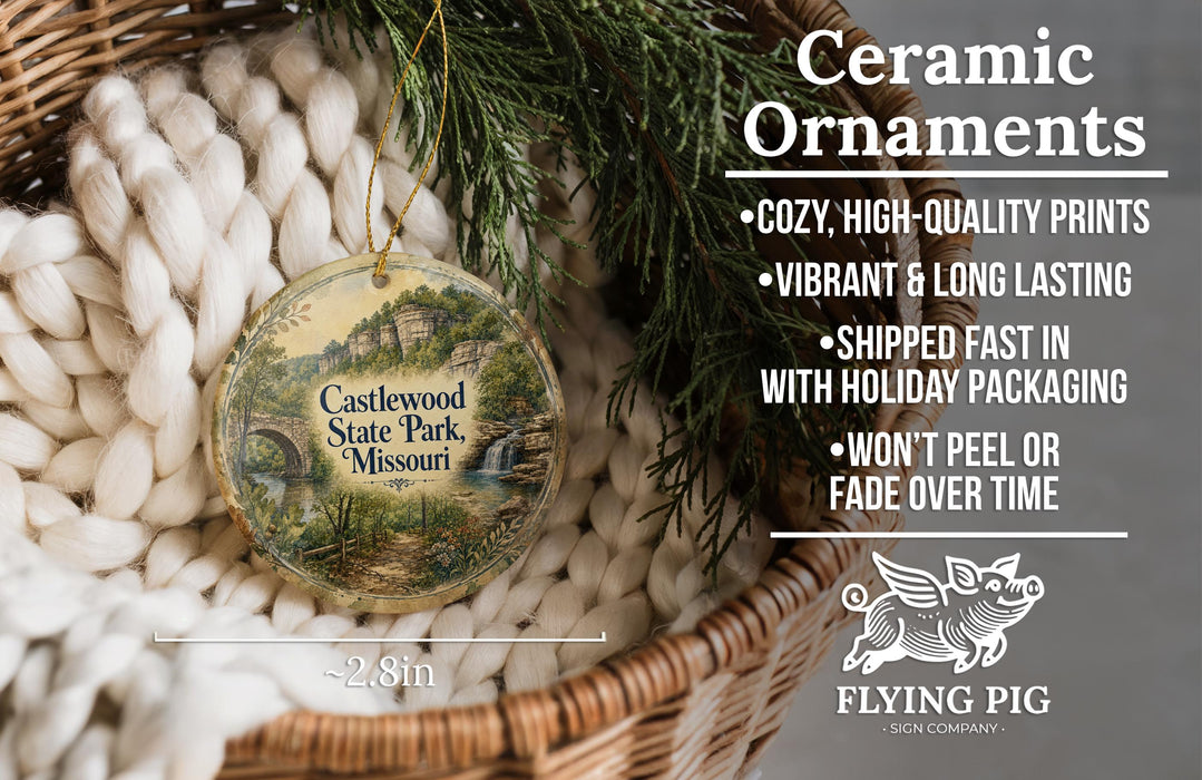 Ceramic ornaments, featuring a scenic image of Castlewood State Park, Missouri, hanging from a wicker basket.