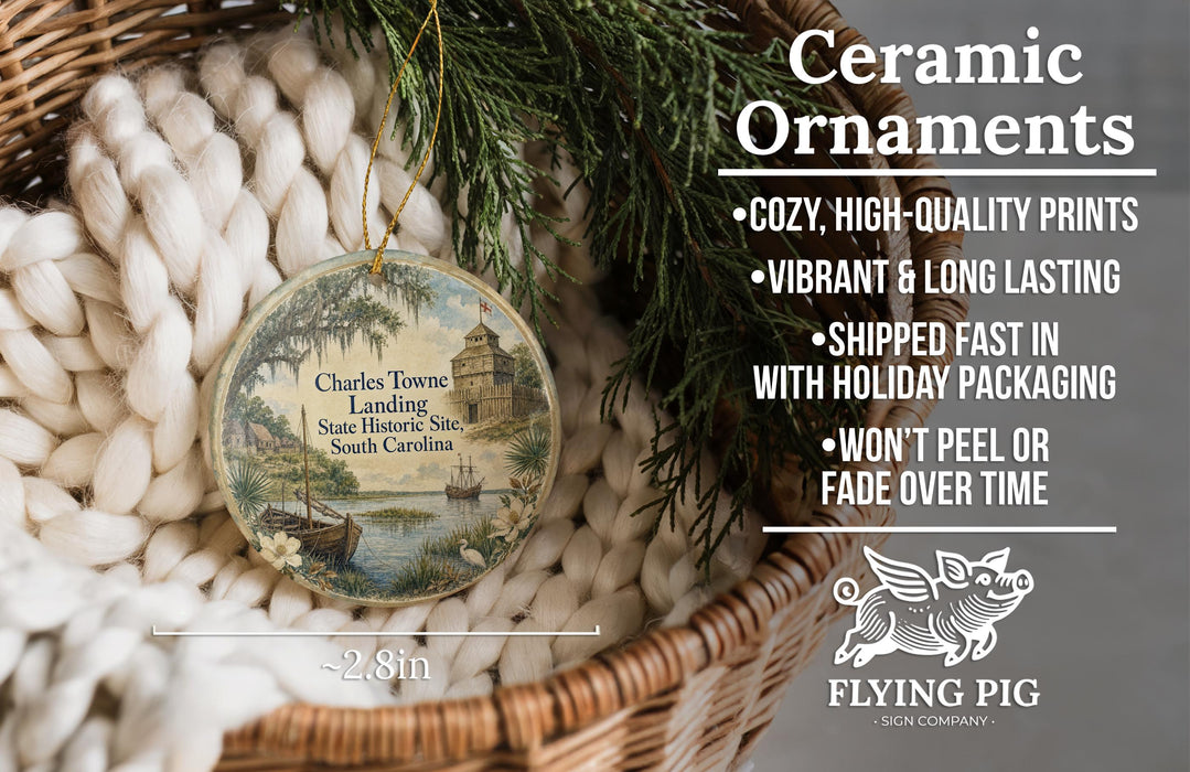 Ceramic ornaments, featuring a round ornament with a scenic image of a river and a building, hanging from a wicker basket.