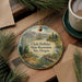 A round ornament with a scenic landscape of a lake, mountains, and pine trees, along with the text "Clyde Holliday State Recreation Site, Oregon".