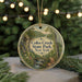 A round ornament with a scenic image of Coles Creek State Park, New York, hanging from a string.