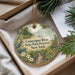 A decorative ornament with a scenic image of the Connecticut River State Park Preserve, New York, featuring a bird, flowers, and a path.