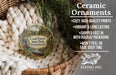 Ceramic ornaments, featuring a picture of Cook Forest State Park, Pennsylvania, hanging in a basket with pine branches.