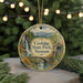 A circular ornament featuring a scenic image of Coolidge State Park in Vermont, with a waterfall and a bridge in the background.