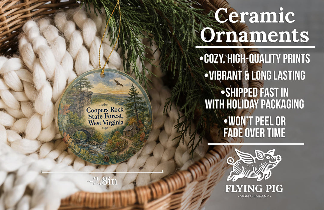 Ceramic ornaments, featuring a scenic image of the Copper Rock State Forest in West Virginia, are displayed in a woven basket.