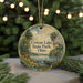 A round ornament with a scenic landscape depicting Cowan Lake State Park, Ohio, featuring a deer, canoe, and trees.