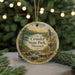 A decorative ornament featuring a scenic landscape of Crowder State Park, Missouri, with a waterfall and a tower in the background.