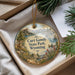 A decorative ornament with a scenic landscape of curt Gowdy State Park, Wyoming, featuring a mountain, river, and wildlife.