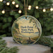 A circular ornament with a scenic landscape of Dash Point State Park in Washington, featuring a beach, trees, and a body of water.