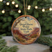 A circular ornament with a scenic image of the Dead Horse Point State Park in Utah, featuring a winding river and a mountain landscape.