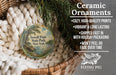 Ceramic ornaments, featuring a vintage-style design of a tree and a river, are displayed in a woven basket.