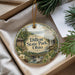 A decorative ornament with a scenic image of Dillon State Park, Ohio, hanging from a string.