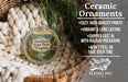 Ceramic ornaments, specifically Douthat State Park, Virginia ornaments, are displayed in a basket with pine branches.