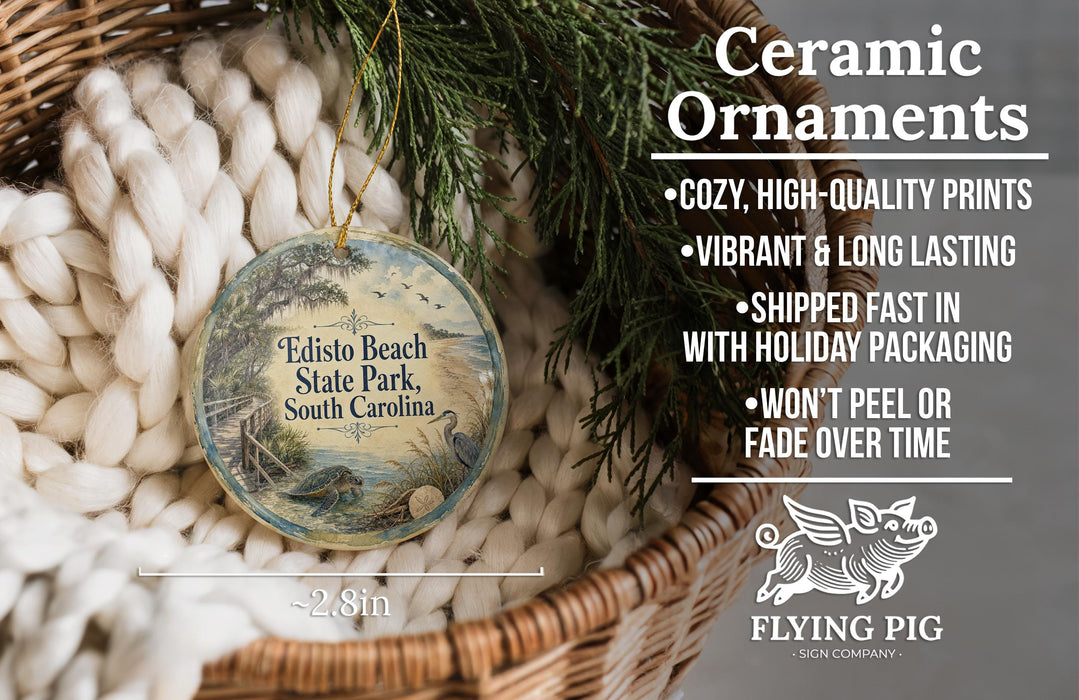 Ceramic ornaments, featuring a round ornament with a scenic image of Edisto Beach State Park, South Carolina, hanging from a wicker basket.