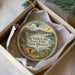 A decorative ornament with a scenic landscape of El Vado Lake, State Park, New Mexico, featuring mountains, a lake, and a bird in flight.