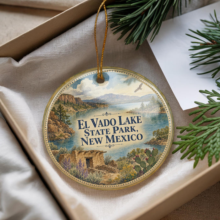 A decorative ornament with a scenic landscape of El Vado Lake, State Park, New Mexico, featuring mountains, water, and greenery.